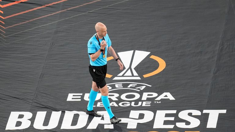 British referee Anthony Taylor after the Europa League final soccer match between Sevilla and Roma, at the Puskas Arena in Budapest, Hungary, Wednesday, May 31, 2023. (AP Photo/Darko Vojinovic)