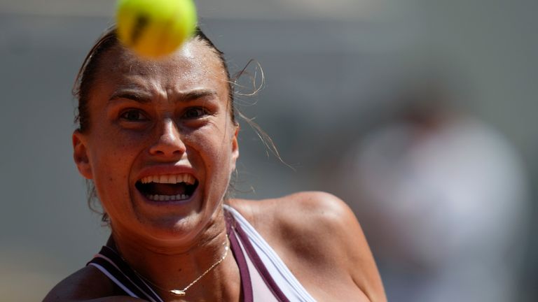 Aryna Sabalenka of Belarus eyes the ball as she plays a shot against Russia's Kamilla Rakhimova during their third round match of the French Open tennis tournament at the Roland Garros stadium in Paris, Friday, June 2, 2023. (AP Photo/Thibault Camus)