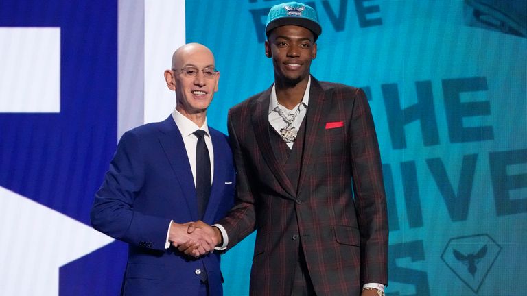 Brandon Miller with NBA Commissioner Adam Silver after being selected second overall by the Charlotte Hornets