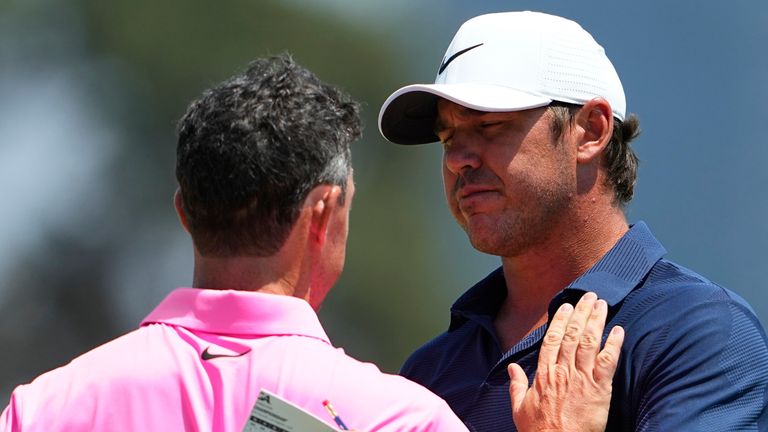 Brooks Koepka greetes Rory McIlroy after their second round at the U.S. Open golf tournament at Los Angeles Country Club on Friday, June 16, 2023, in Los Angeles. (AP Photo/Matt York)