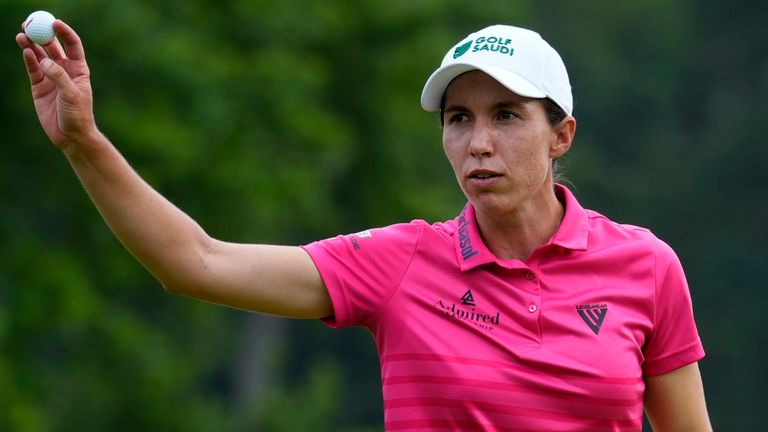 Carlota Ciganda, of Spain, waves as she walks off the 18th green after finishing her final round of the Women's PGA Championship golf tournament, Sunday, June 25, 2023, in Springfield, N.J. (AP Photo/Matt Rourke)