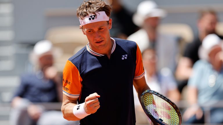 Norway&#39;s Casper Ruud clenches his fist after scoring a point against Italy&#39;s Giulio Zeppieri during their second round match of the French Open tennis tournament at the Roland Garros stadium in Paris, Thursday, June 1, 2023. (AP Photo/Jean-Francois Badias)