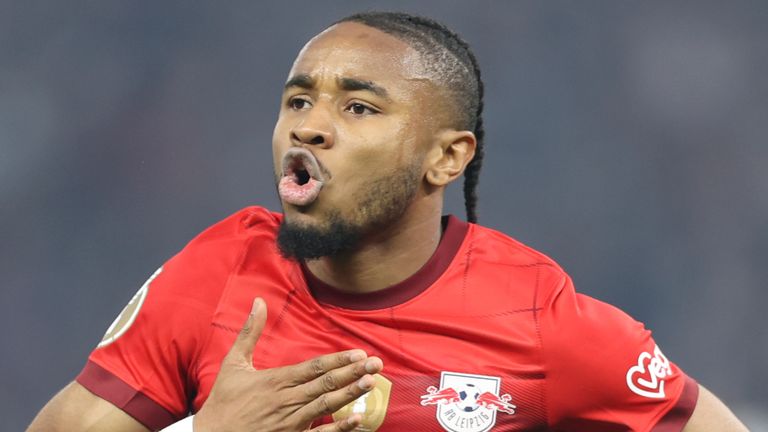 Leipzig's Christopher Nkunku celebrates after scoring his side's opening goal during the German soccer cup, DFB Pokal, final match between RB Leipzig and Eintracht Frankfurt at Olympiastadion in Berlin, Germany, Saturday, June 3, 2023. (AP Photo/Andreas Gora)