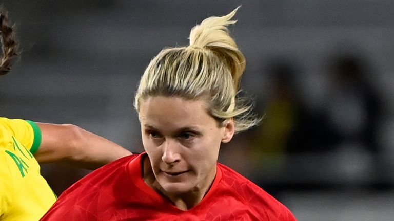 Canada forward Cloe Lacasse (20) moves the ball ahead of Brazil midfielder Ana Vitoria, left, during the second half of a SheBelieves Cup women's soccer match Sunday, Feb. 19, 2023, in Nashville, Tenn. (AP Photo/Mark Zaleski)
