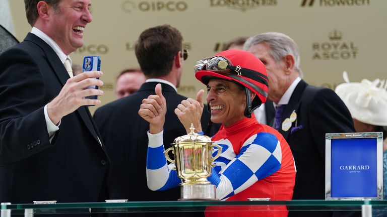 John Velazquez celebrates after Crimson Advocate won the Queen Mary Stakes in a photo finish