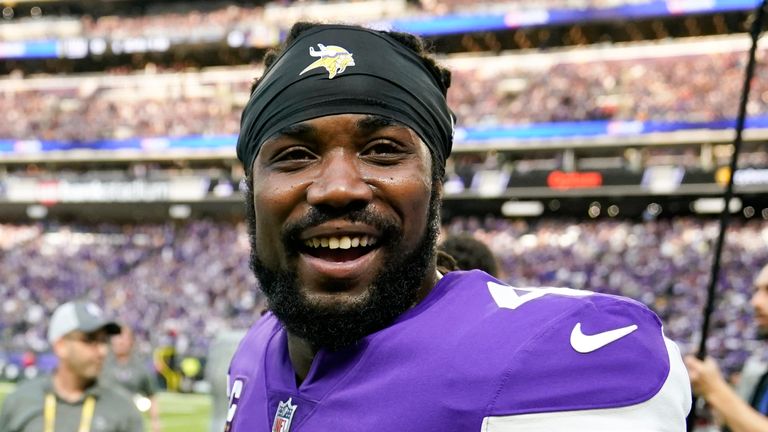 Minnesota Vikings running back Dalvin Cook walks on the field before an NFL wild card playoff football game against the New York Giants, Sunday, Jan. 15, 2023, in Minneapolis. (AP Photo/Charlie Neibergall)