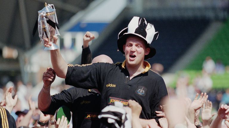 LONDON, ENGLAND - MAY 17: Newcastle Falcons player Doddie Weir is chaired off with the trophy after the Falcons had beaten Harlequins to claim the 1997/98 Allied Dunbar Premiership Title at the Stoop on May 17, 1998 in London, England. (Photo Tom Shaw/Allsport/Getty Images/Hulton Archive)