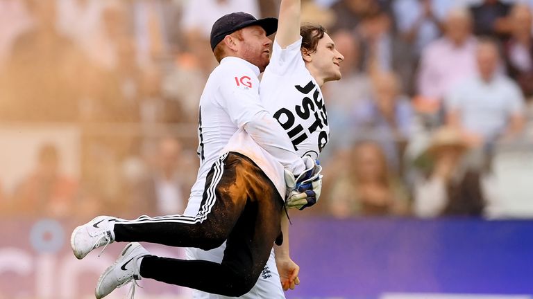 Jonny Bairstow carries a Just Stop Oil protestor off the field at Lord&#39;s