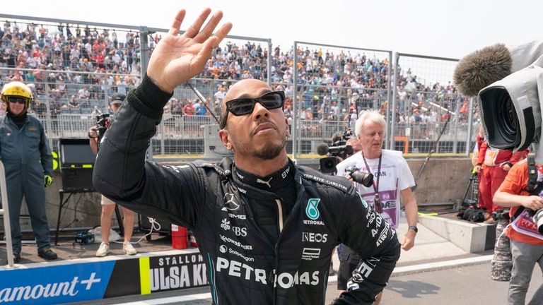 Lewis Hamilton waves to the crowd during the suspended Practice One session at the Canadian GP