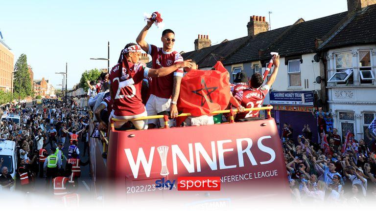 Rob Jones joins the West Ham squad onboard their open-top bus parade as they show off the Europa Conference League trophy in front of tens of thousands of fans.