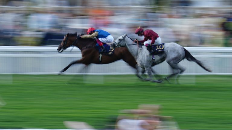 Gregory fights off the challenge of Saint George to win the Queen's Vase