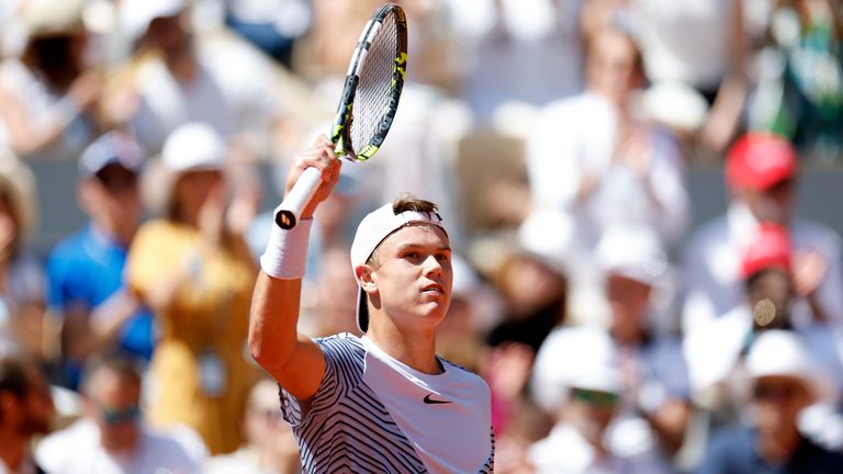 Denmark&#39;s Holger Rune celebrates winning his third round match of the French Open tennis tournament against Argentina&#39;s Genaro Alberto Olivieri at the Roland Garros stadium in Paris, Saturday, June 3, 2023. (AP Photo/Jean-Francois Badias)