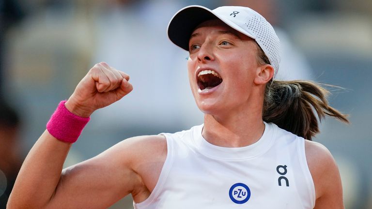 Poland&#39;s Iga Swiatek celebrates winning her semifinal match of the French Open tennis tournament of the French Open tennis tournament against Brazil&#39;s Beatriz Haddad Maia in two sets, 6-2, 7-6 (9-7),at the Roland Garros stadium in Paris, Thursday, June 8, 2023. (AP Photo/Christophe Ena)