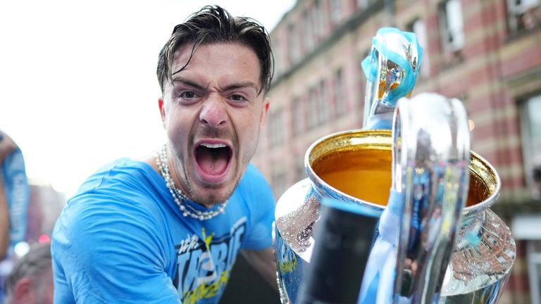 Jack Grealish celebrates during Manchester City's Treble parade