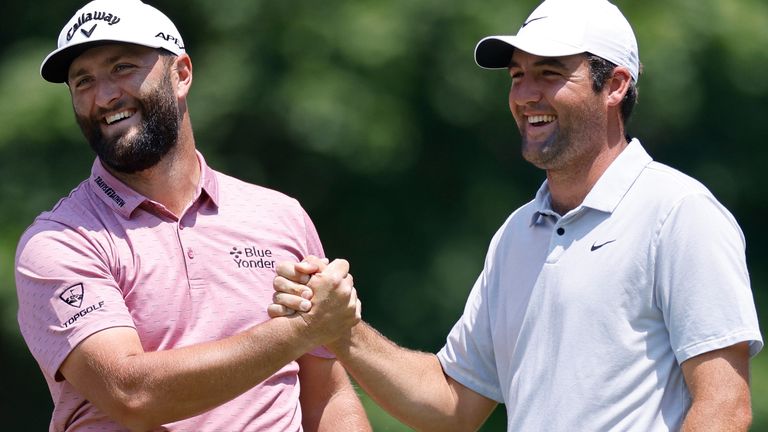 DUBLIN, OH - JUNE 04: Jon Rahm of Spain is congratulated by Scottie Scheffler of the United States after holing his approach shot from the fairway at the 9th hole for eagle during the final round of the Memorial Tournament presented by Workday at Muirfield Village Golf Club on June 04, 2023 in Dublin, Ohio. (Photo by Joe Robbins/Icon Sportswire) (Icon Sportswire via AP Images)