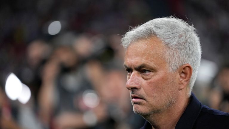 Roma's head coach Jose Mourinho walks on the field after loosing the Europa League final soccer match against Sevilla at the Puskas Arena stadium in Budapest, Hungary, Thursday, June 1, 2023. (AP Photo/Darko Bandic)