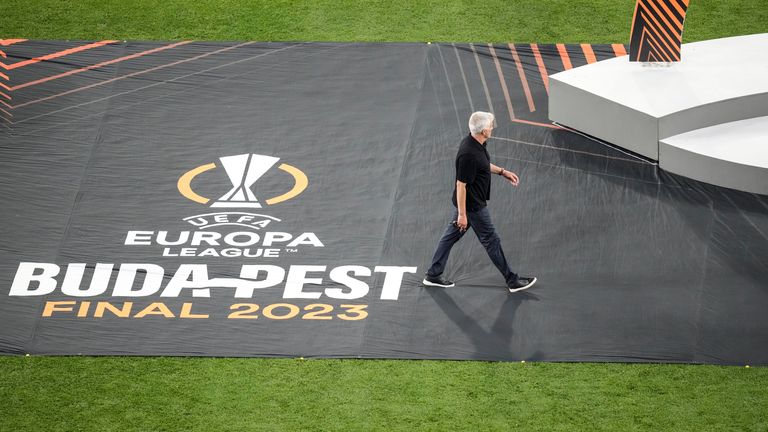 Roma's head coach Jose Mourinho walks on after the Europa League final soccer match between Sevilla and Roma, at the Puskas Arena in Budapest, Hungary, Wednesday, May 31, 2023. Sevilla won 5-2 following a penalty shootout. (AP Photo/Darko Vojinovic)