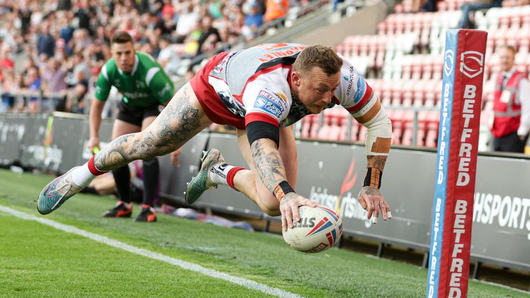 Picture by Paul Currie/SWpix.com - 09/06/2023 - Rugby League - Betfred Super League Round 15 - Leigh Leopards v Hull FC - Leigh Sports Village, Leigh , England - Leigh Leopards' Josh Charnley scoring the 3rd try