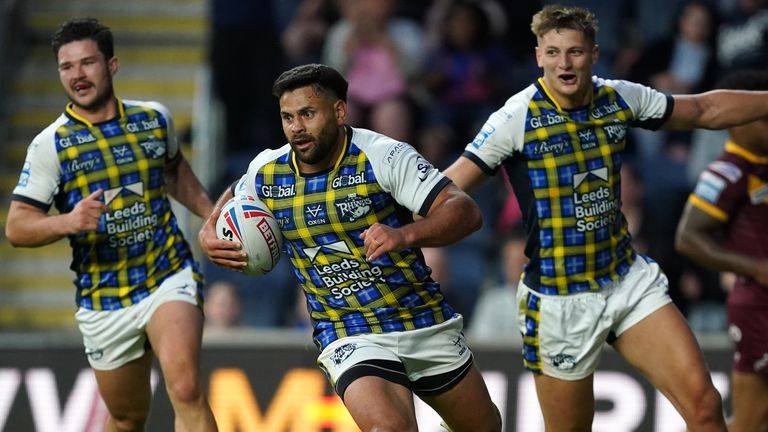 Leeds Rhinos&#39; Rhyse Martin runs in to score one of his two tries against Huddersfield