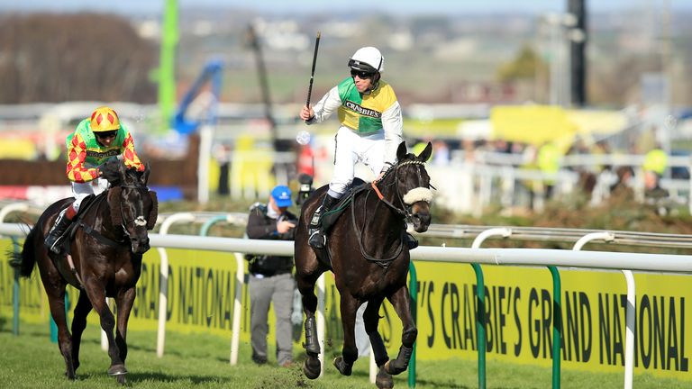 Many Clouds wins the 2015 Grand National under jockey Leighton Aspell