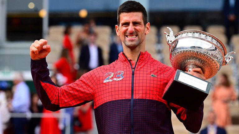 Serbia&#39;s Novak Djokovic poses with his trophy as he celebrates his victory over Norway&#39;s Casper Ruud during their men&#39;s singles final match on day fifteen of the Roland-Garros Open tennis tournament at the Court Philippe-Chatrier in Paris on June 11, 2023. (Photo by Emmanuel DUNAND / AFP) (Photo by EMMANUEL DUNAND/AFP via Getty Images)