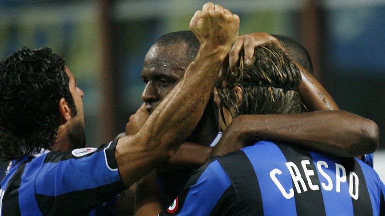 Inter of Milan Patrick Vieira, of France is hugged by teammates Luis Figo, of Portugal, left, and Hernan Crespo, of Argentina, after scoring during the Italian Supercup soccer match between Inter of Milan and AS Roma in Milan, Italy, Saturday, Aug. 26, 2006. 
