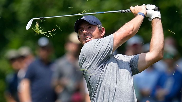 Rory McIlroy, of Northern Ireland, watches his shot to the ninth green during the third round of the Memorial golf tournament, Saturday, June 3, 2023, in Dublin, Ohio. (AP Photo/Darron Cummings)