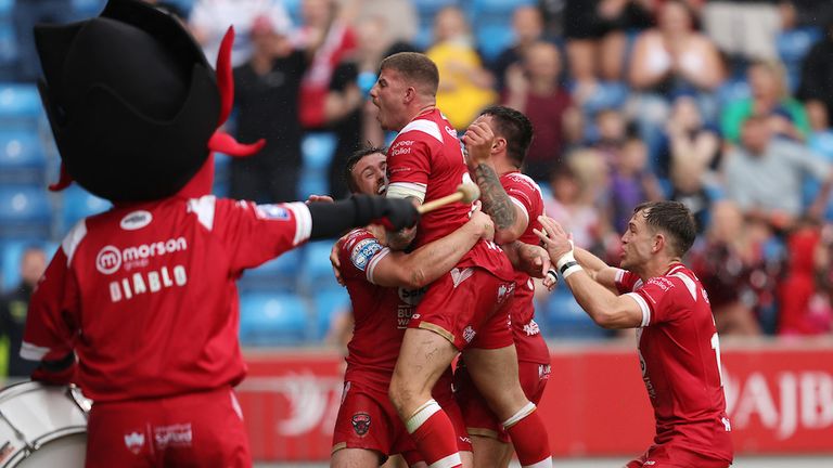 Salford Red Devils crossed the whitewash late in the second half through Hellewell
