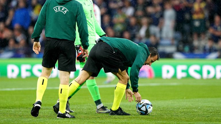 Referee Istvan Vad held two inspections before putting the game on at 9.15pm