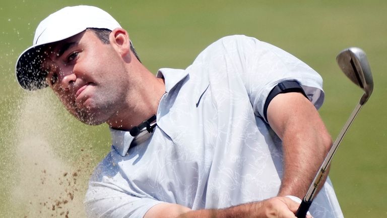 Scottie Scheffler hits from a bunker to the 17th green during a practice round of the U.S. Open golf tournament at Los Angeles Country Club, Monday, June 12, 2023, in Los Angeles. (AP Photo/Marcio Jose Sanchez) 