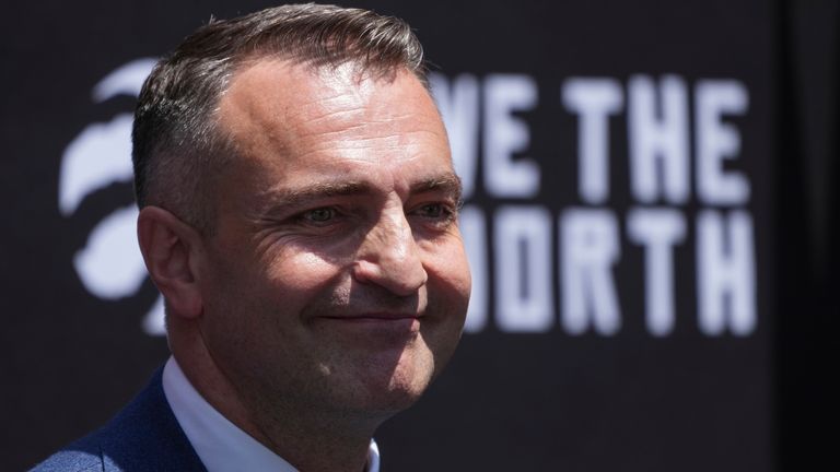 Darko Rajakovic could not stop smiling as he was introduced as the Toronto Raptors' new head coach