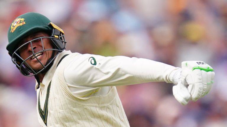 Usman Khawaja admitted he was emotional as he tossed his bat in the air after reaching a century 