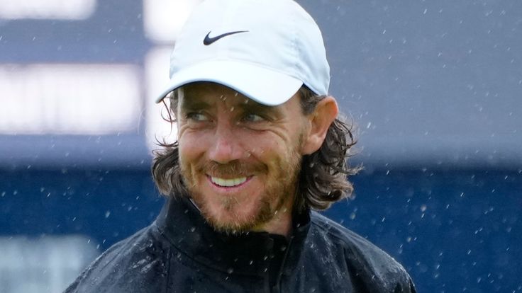 England's Tommy Fleetwood smiles as he walks on the 17th green during a practice round for the British Open Golf Championships at the Royal Liverpool Golf Club in Hoylake, England, Tuesday, July 18, 2023. The Open starts Thursday, July 20. (AP Photo/Jon Super)