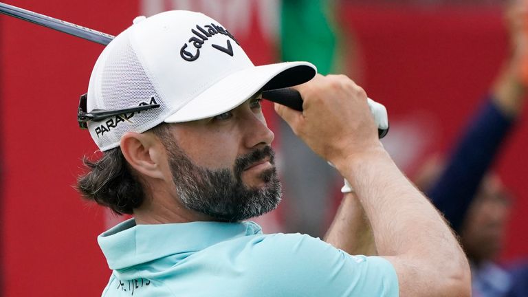 Adam Hadwin drives off the 16th tee during the third round of the Rocket Mortgage Classic golf tournament at Detroit Country Club, Saturday, July 1, 2023, in Detroit. (AP Photo/Carlos Osorio)