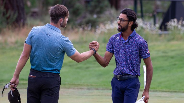 Akshay Bhatia, right, shakes hands with Patrick Rodgers after winning the Barracuda Championship at the Tahoe Mountain Club in California (AP Photo/Tom R. Smedes)