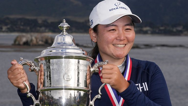 Allisen Corpuz poses with the winner's trophy after the U.S. Women's Open golf tournament at the Pebble Beach Golf Links, Sunday, July 9, 2023, in Pebble Beach, Calif. (AP Photo/Darron Cummings)