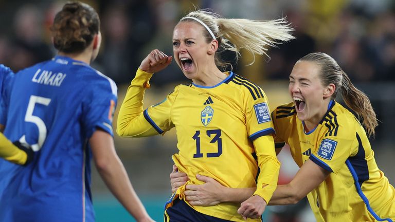 Sweden's Amanda Ilestedt, second from right, celebrates with Sweden's Magdalena Eriksson after scoring her side's 4th goal and celebrate the fourth goal of the match during the Women's World Cup Group G soccer match between Sweden and Italy in Wellington, New Zealand, Saturday, July 29, 2023. (AP Photo/Alysa Rubin)