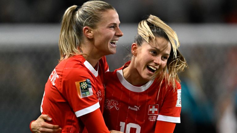 Switzerland's Ana Maria Crnogorcevic, left, celebrates with Switzerland's Viola Calligaris after the Women's World Cup Group A soccer match between New Zealand and Switzerland in Dunedin, New Zealand, Sunday, July 30, 2023. (AP Photo/Andrew Cornaga)