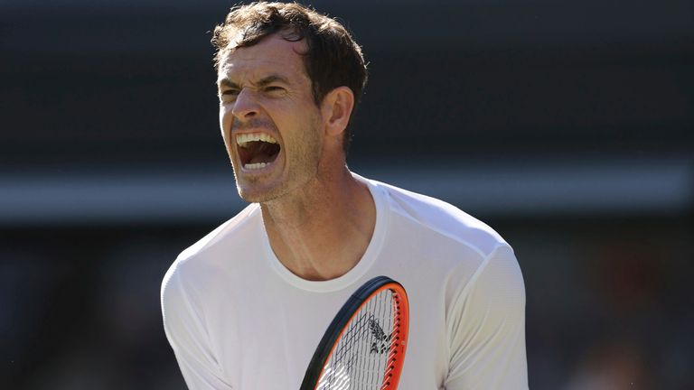 Andy Murray of Britain reacts after scoring a point against Stefanos Tsitsipas of Greece in their Wimbledon men's second round match July 7 at the All England Lawn Tennis and Croquet Club in London, United Kingdom.  2023. The game was postponed due to the closure of the tournament the day before.  (The Yomiuri Shimbun via AP Images)