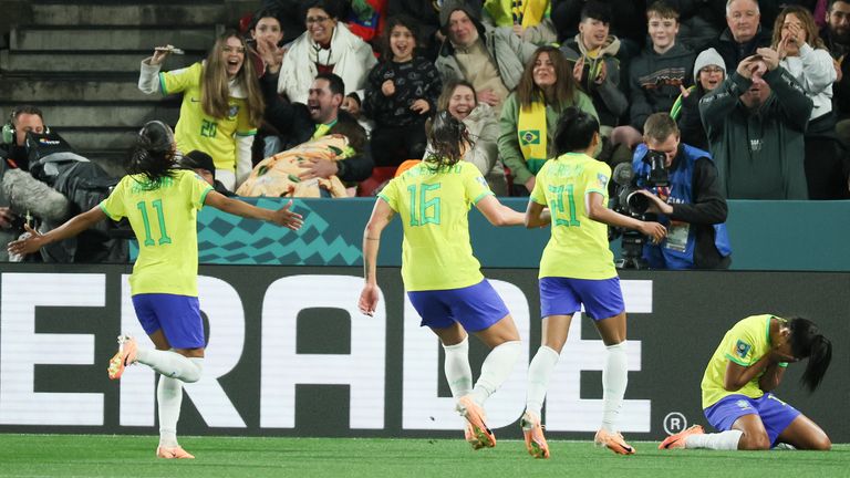 Brazil's Ary Borges, right, reacts as her teammates celebrate after scoring her team's first goal during the Women's World Cup Group F soccer match between Brazil and Panama in Adelaide, Australia, Monday, July 24, 2023. (AP Photo/James Elsby)
