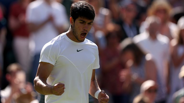 Carlos Alcaraz celebrates winning his match against Alexandre Muller (not pictured) on day five of the 2023 Wimbledon Championships at the All England Lawn Tennis and Croquet Club in Wimbledon.  Image date: Friday July 7, 2023.