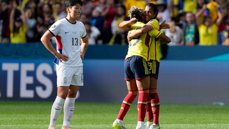South Korea's Park Eun-sun, stands on the pitch as Colombia's players celebrate at the end of the Women's World Cup Group H soccer match between Colombia and South Korea at the Sydney Football Stadium in Sydney, Australia, Tuesday, July 25, 2023. (AP Photo/Rick Rycroft)