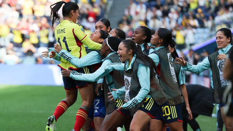 Colombia's Catalina Usme, left, celebrates with teammates after scoring from a penalty kick during the Women's World Cup Group H soccer match between Colombia and South Korea at Sydney Football Stadium in Sydney, Australia, Tuesday, July 25, 2023. (AP Photo/Sophie Ralph)