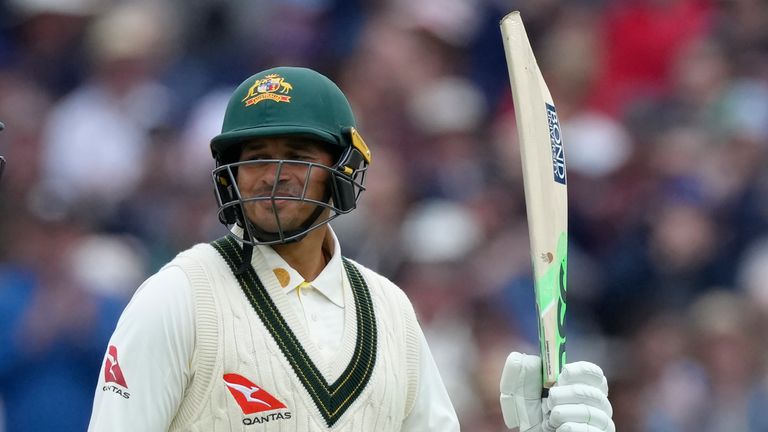 Australia's Usman Khawaja, raises his bat after reaching 50 in the second Ashes Test at Lord's (AP)
