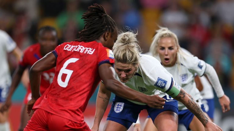 Haiti's Melchie Dumornay competes for the ball with England's Millie Bright during the Women's World Cup Group D soccer match between England and Haiti in Brisbane, Australia, Saturday, July 22, 2023. (AP Photo/Katie Tucker)