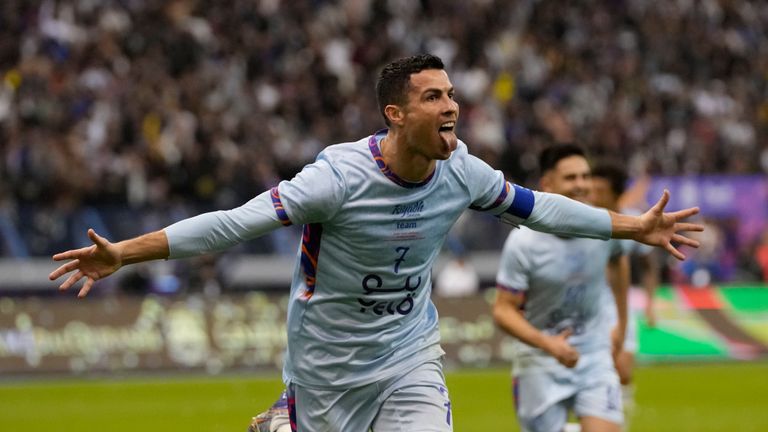 Cristiano Ronaldo celebrates after scoring his side&#39;s second goal playing for a combined XI of Saudi Arabian teams Al Nassr and PSG during a friendly soccer match