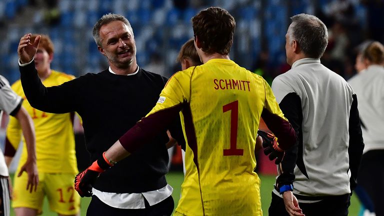 European Championship, Germany - France, final round, final at Hidegkuti Nandor Stadium, Christian Wuck, coach of Germany, cheers with goalkeeper Max Schmitt after the match.