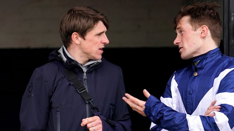 Harry Skelton speaks with Sam Twiston-Davies while out of action with a shoulder injury