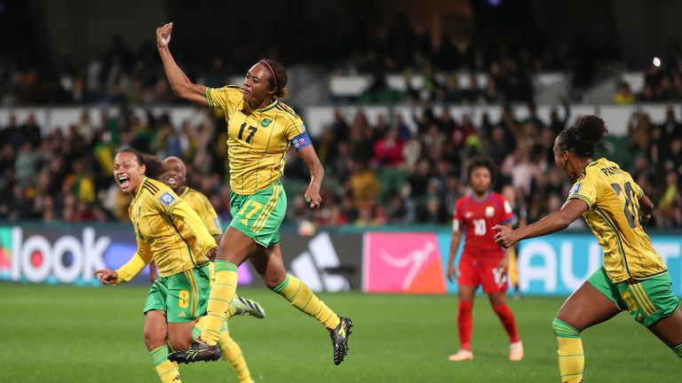 Jamaica's Allyson Swaby, top, celebrates with teammates after scoring the opening goal during the Women's World Cup Group F soccer match between Panama and Jamaica in Perth, Australia, Saturday, July 29, 2023. (AP Photo/Gary Day)