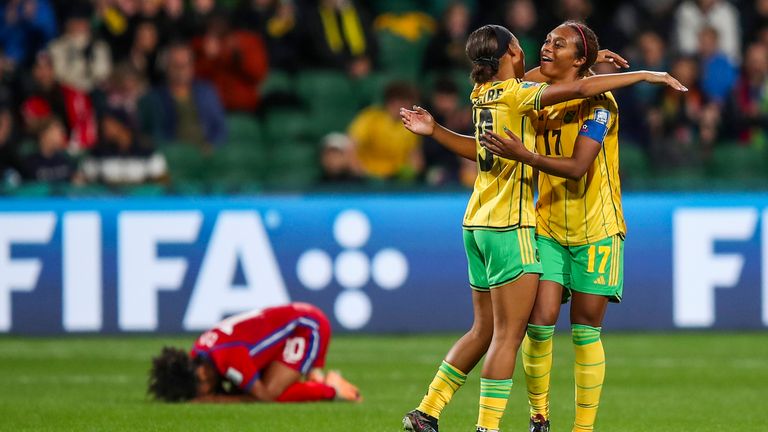 Jamaica's Allyson Swaby, right, and Tiernny Wiltshire celebrate at the end of the Women's World Cup Group F soccer match between Panama and Jamaica in Perth, Australia, Saturday, July 29, 2023. Jamaica won 1-0. (AP Photo/Gary Day)